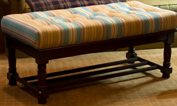 A coffee table up-cycled to an upholstered bench. www.lifeatthecottage.com