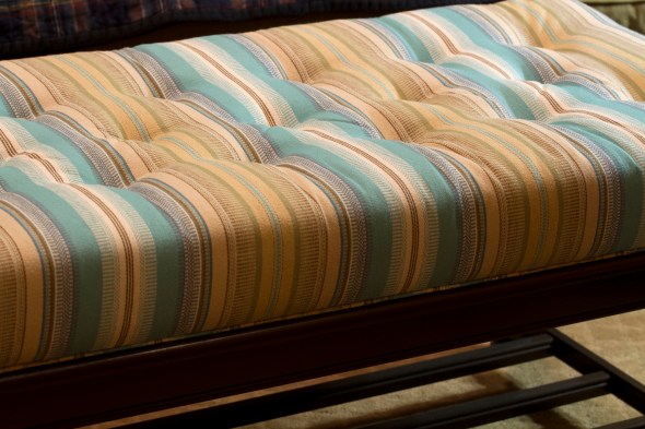 A coffee table up-cycled to an upholstered bench. www.lifeatthecottage.com